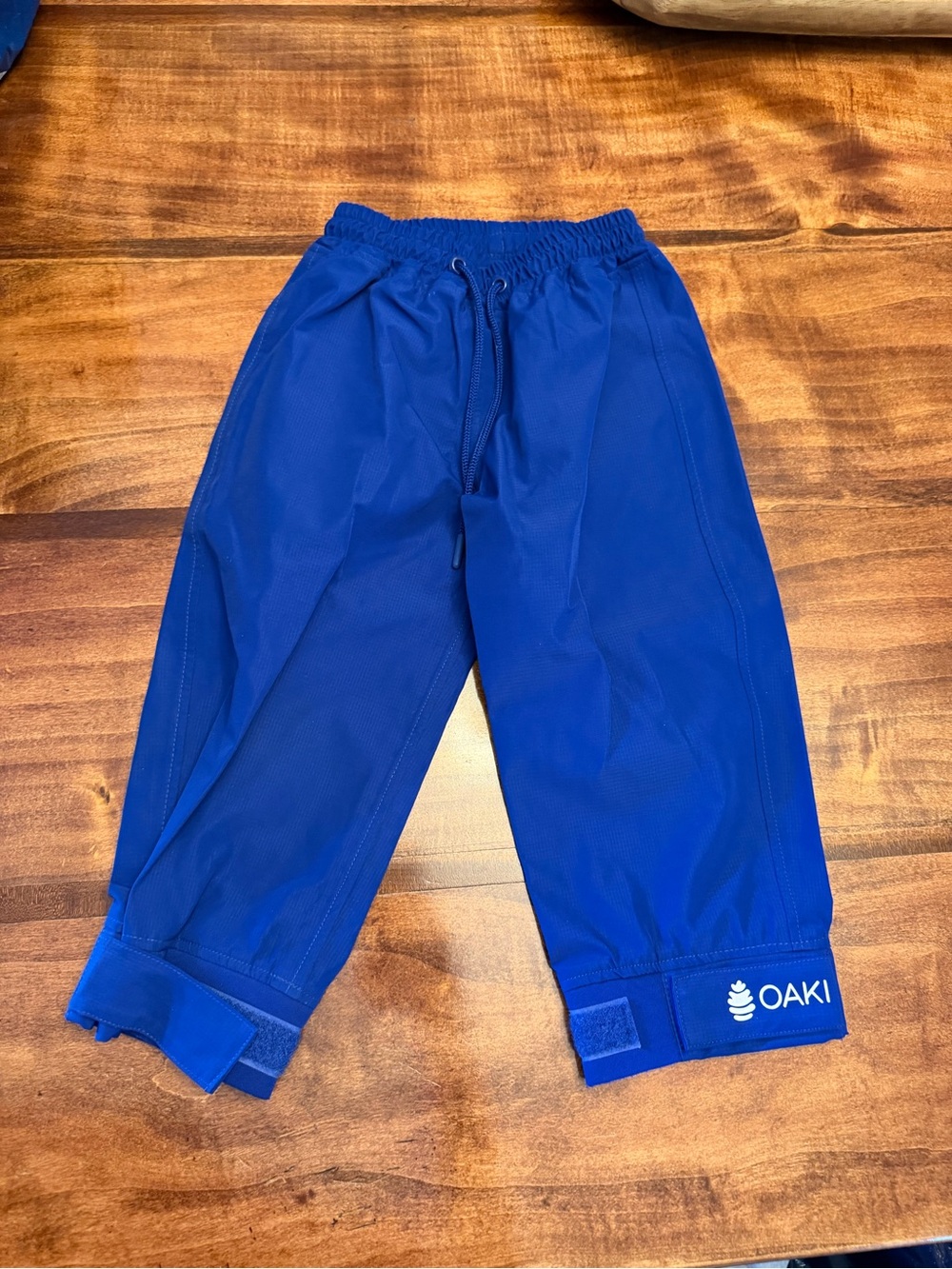 OAKI Royal Blue Kids waterproof trail pants with Adjustable Ankles